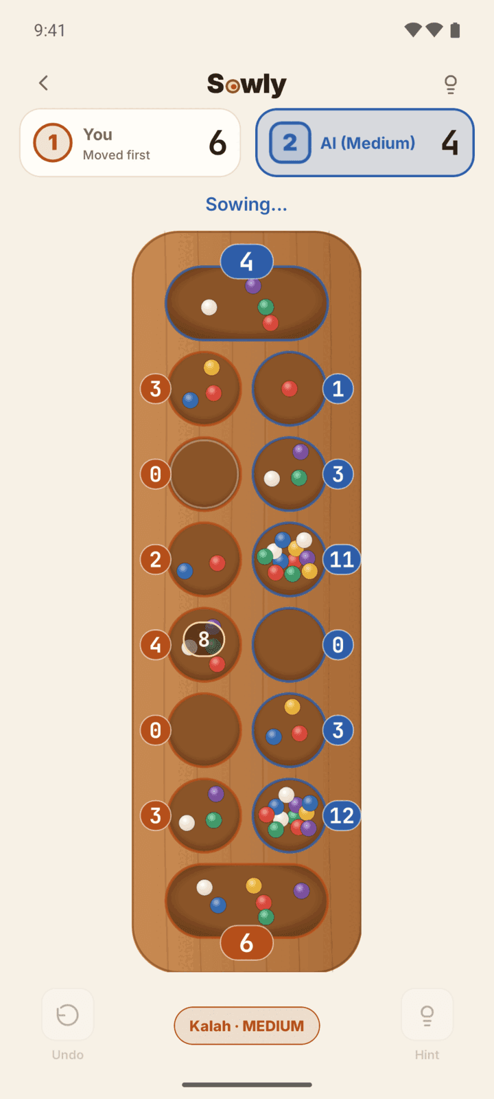 Sowly Kalah game on a wood board against the AI, light theme, while seeds are being sown